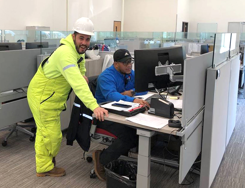 two men in an office