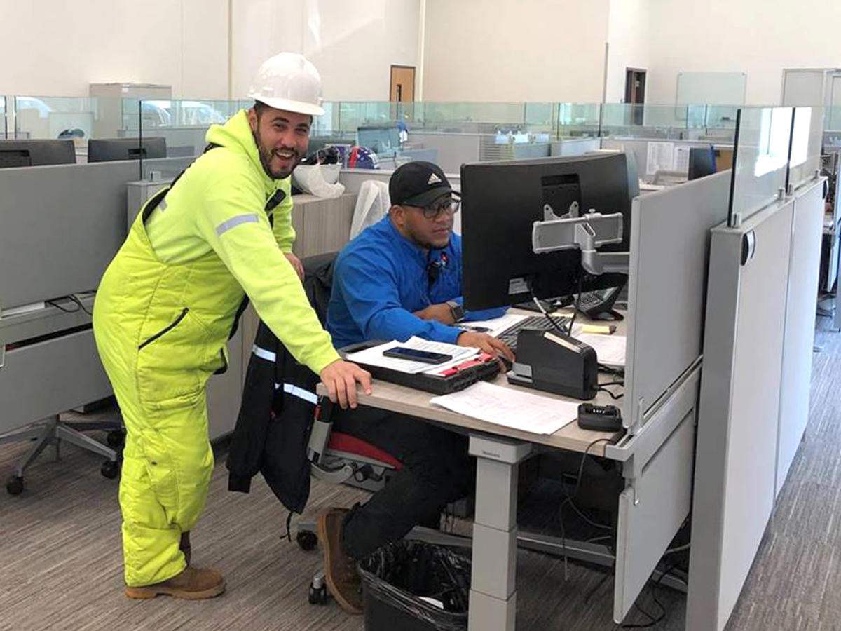 two men in an office