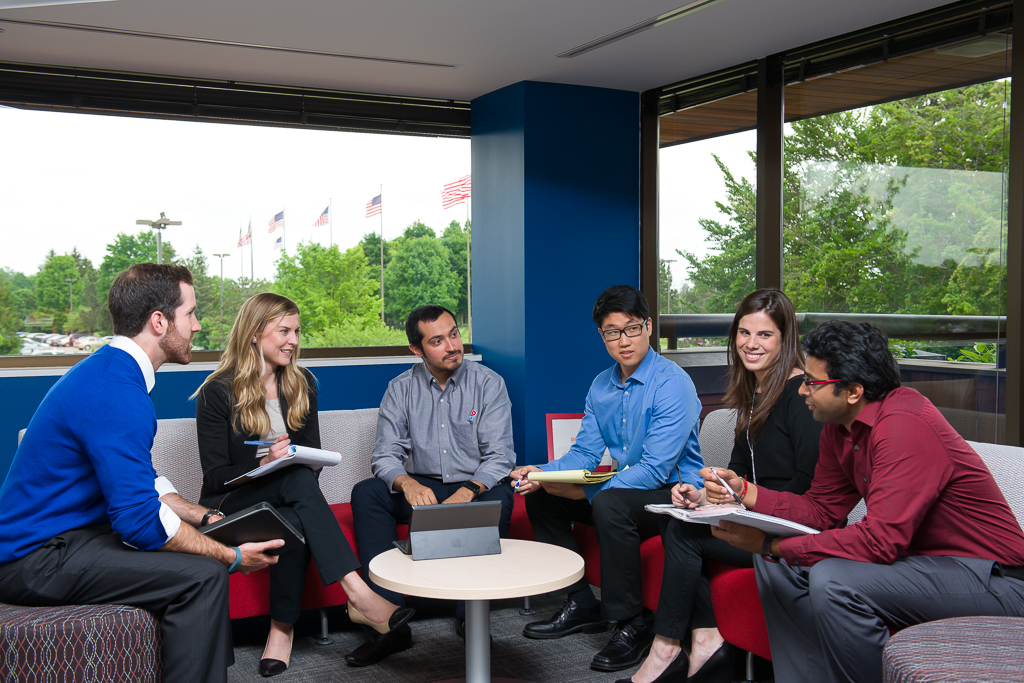 a group of people sitting in a circle