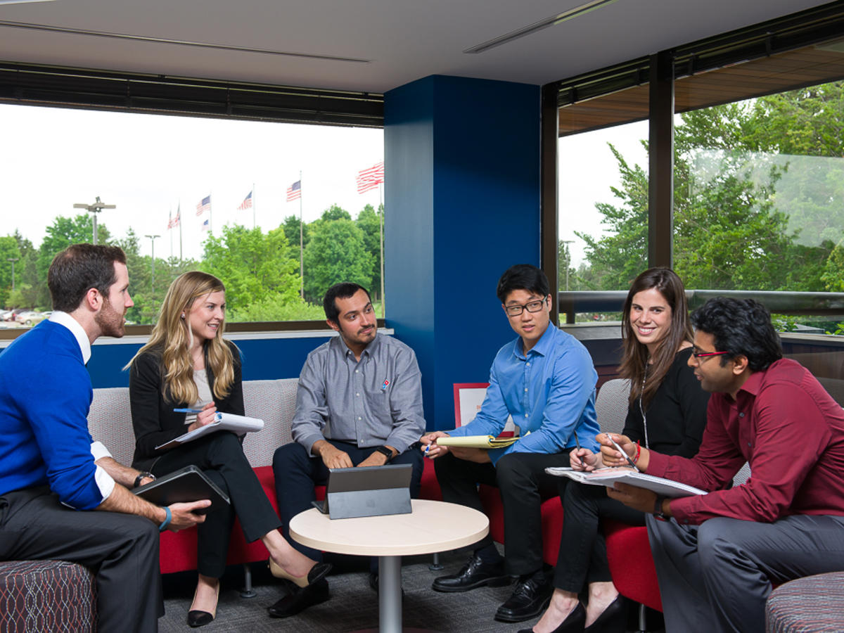 a group of people sitting in a circle
