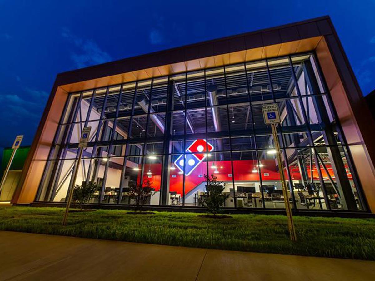 a building with a red and white logo